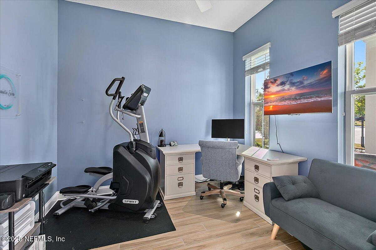 78 Calumet Drive St. Johns, FL 32259 - Photo 7 of 72 a living room with furniture a flat screen tv and a window
