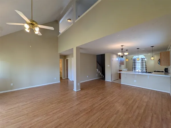 a view of a kitchen with a dishwasher cabinets and a kitchen