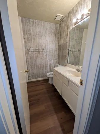 a bathroom with a bathtub and shower