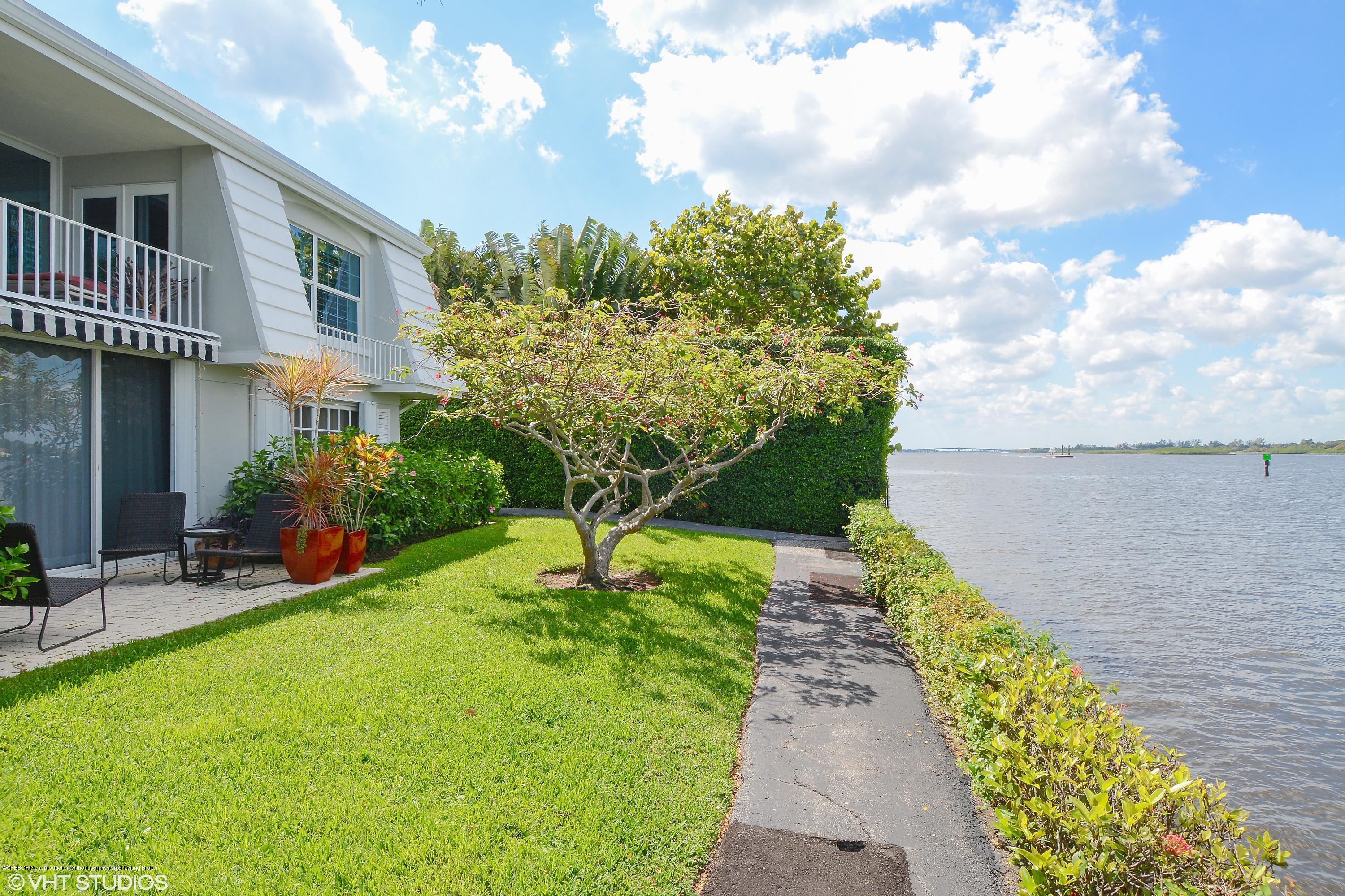 2190 Ibis Isle Road, Unit 1 Palm Beach, FL 33480 - Photo 7 of 8 a view of a pathway with a yard