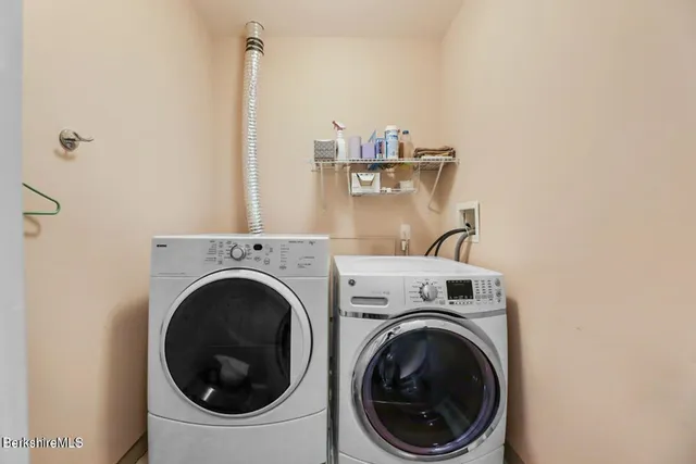 a utility room with dryer and washer
