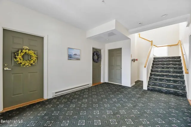 a view of an entryway with stairs