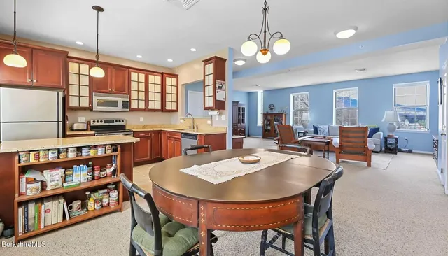 a view of a dining room and livingroom