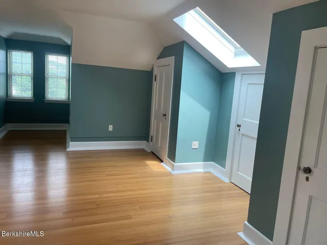a view of livingroom with hardwood floor and window