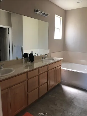 a bathroom with a toilet and a sink
