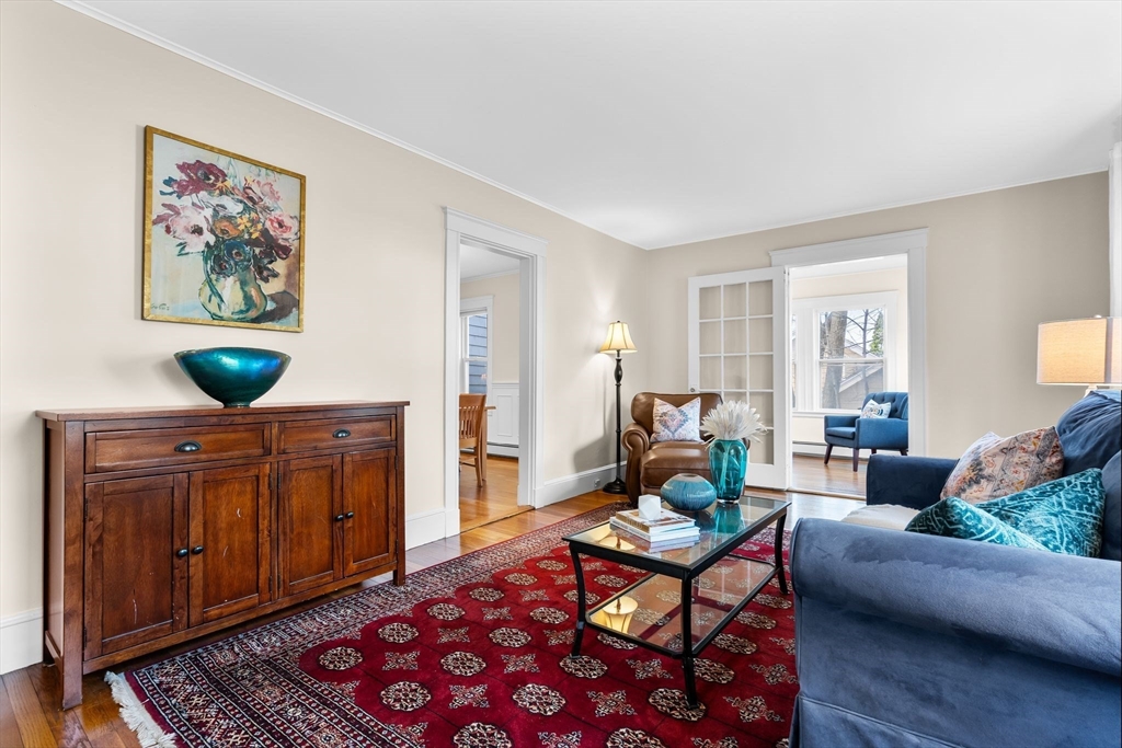 57 Edmund Road Arlington, MA 02474 - Photo 14 of 36 a living room with furniture and a window