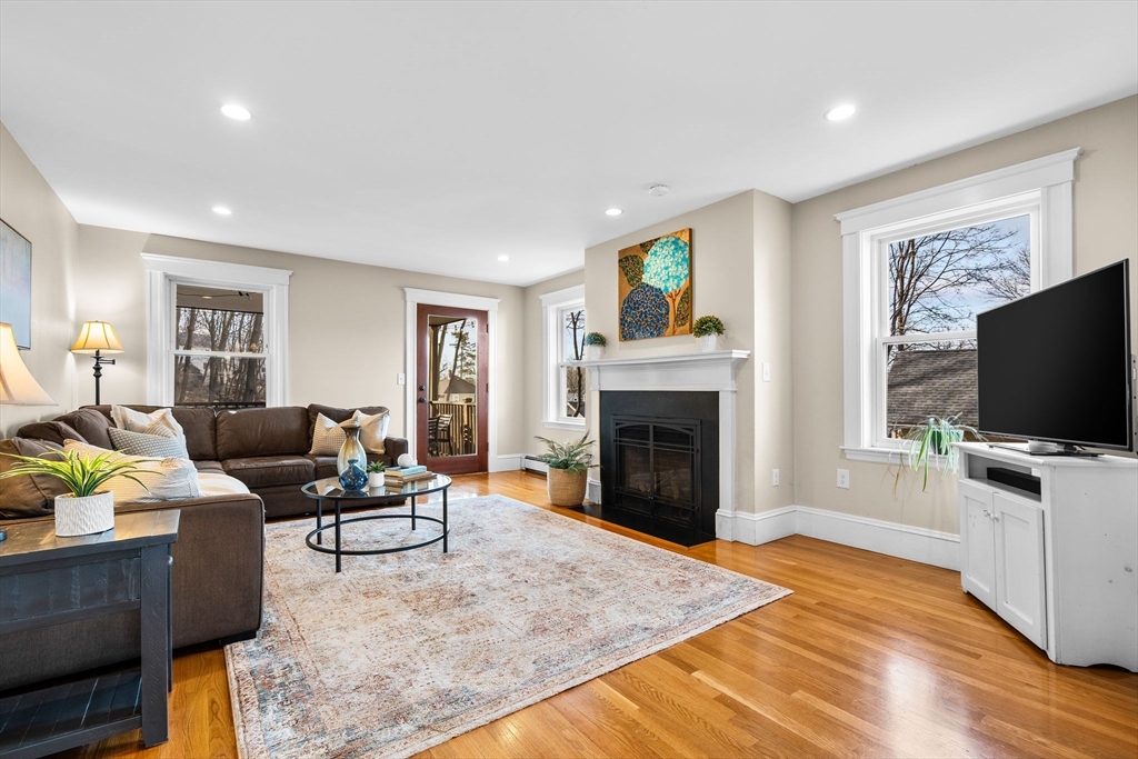 57 Edmund Road Arlington, MA 02474 - Photo 9 of 36 a living room with furniture and a flat screen tv