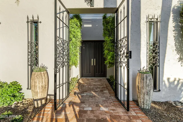 a front view of a house with a glass door