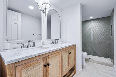 a bathroom with a shower and a toilet