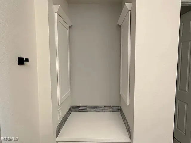 a view of kitchen with windows