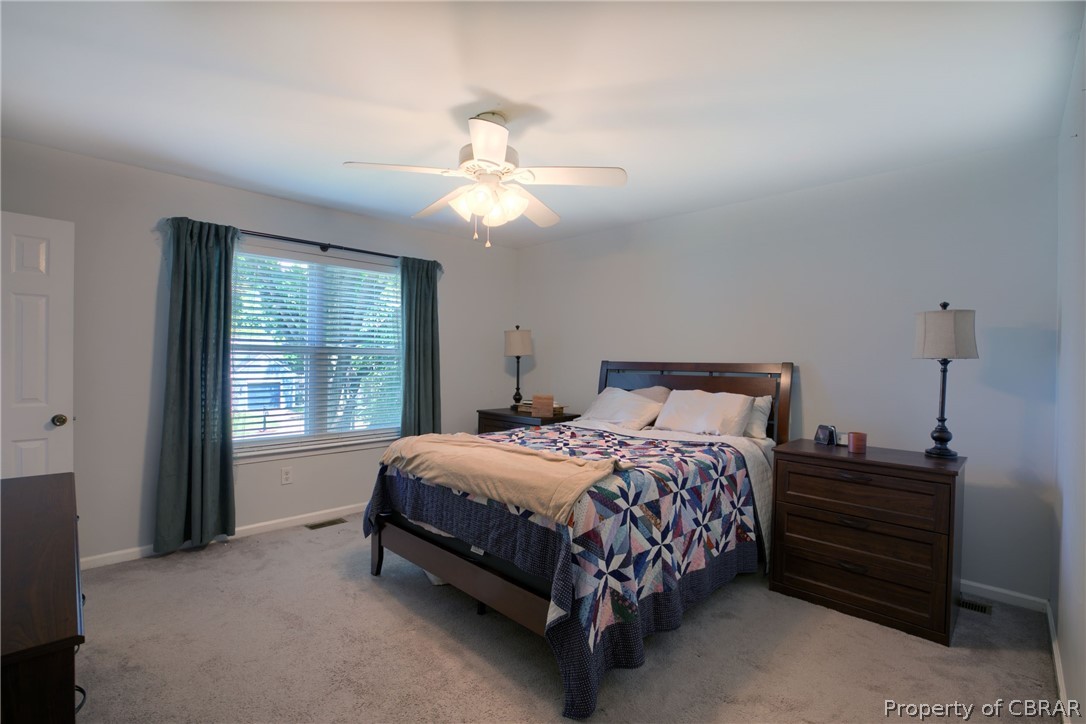 133 Springdale Way Hampton, VA 23666 - Photo 19 of 25 Bedroom with light carpet and ceiling fan