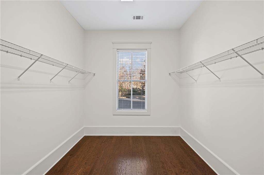120 Walnut Circle Marietta, GA 30064 - Photo 15 of 32 a view of a room with wooden floor and windows