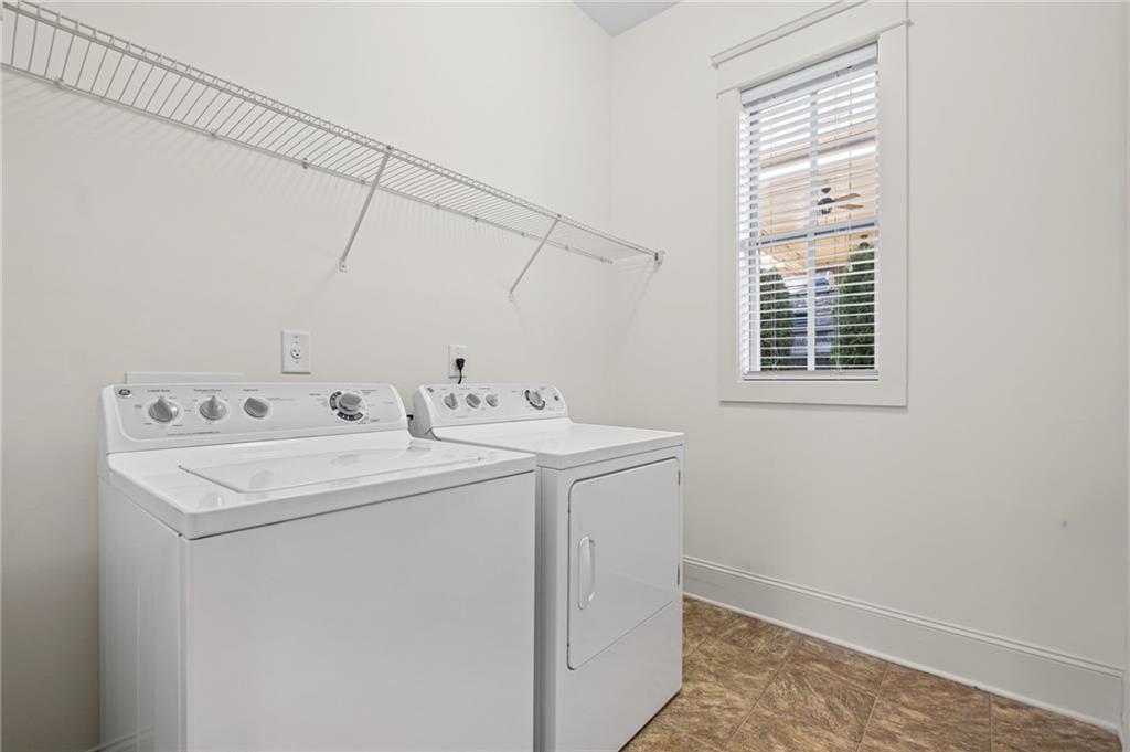 120 Walnut Circle Marietta, GA 30064 - Photo 19 of 32 a utility room with dryer and washer