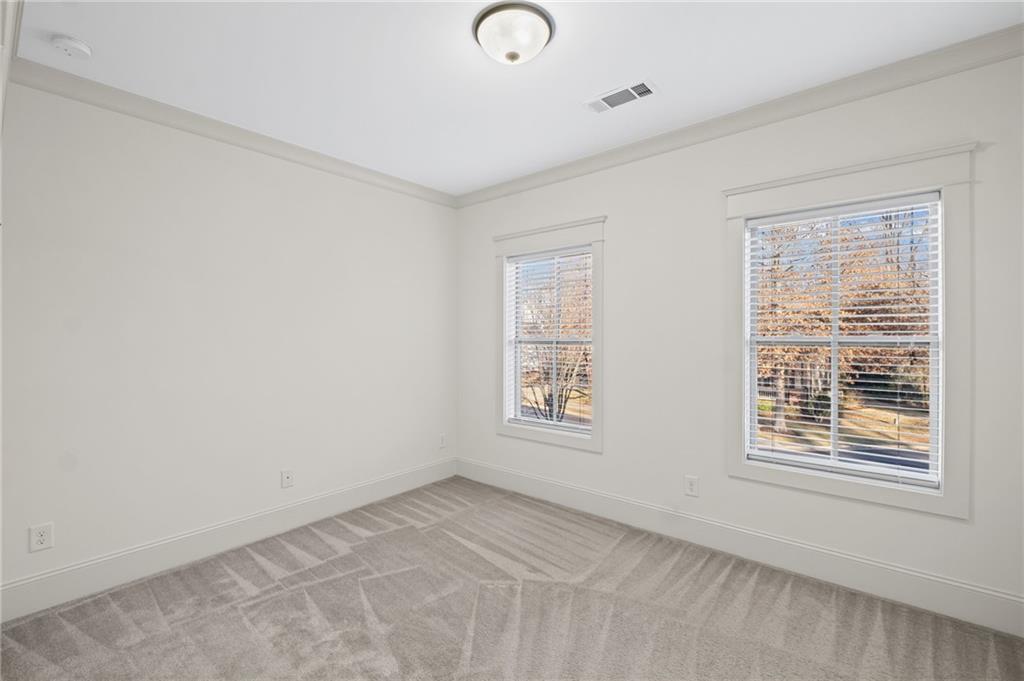 120 Walnut Circle Marietta, GA 30064 - Photo 24 of 32 a view of an empty room with a window