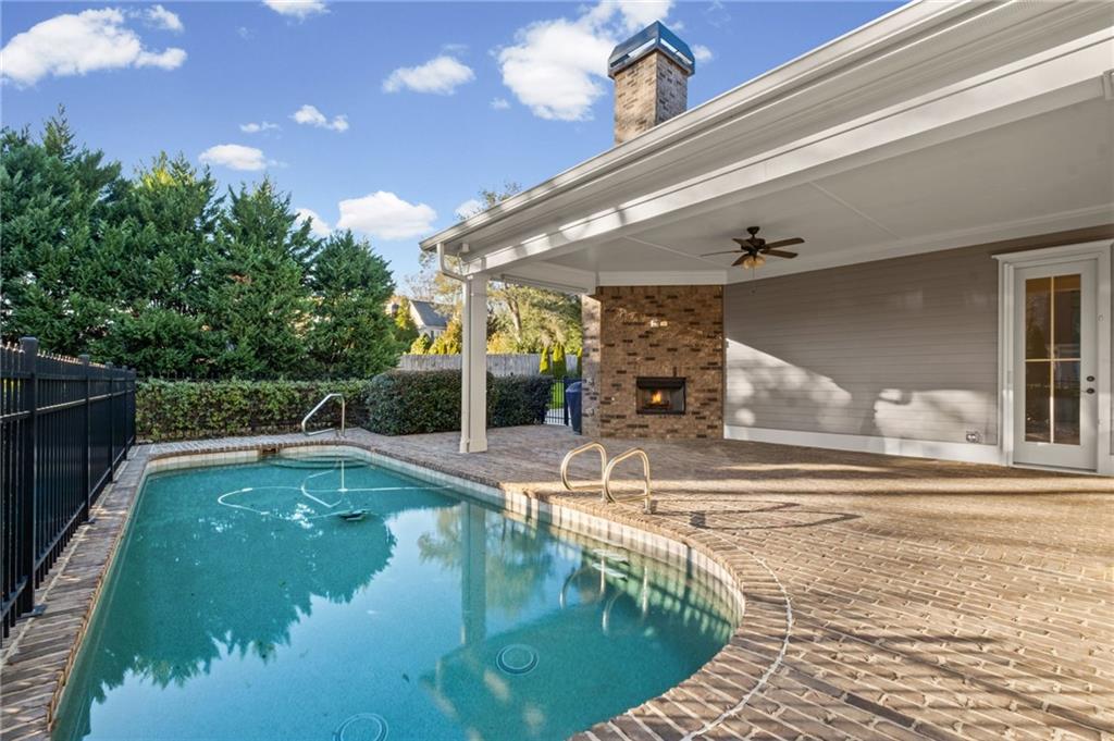 120 Walnut Circle Marietta, GA 30064 - Photo 27 of 32 a view of a swimming pool with a patio