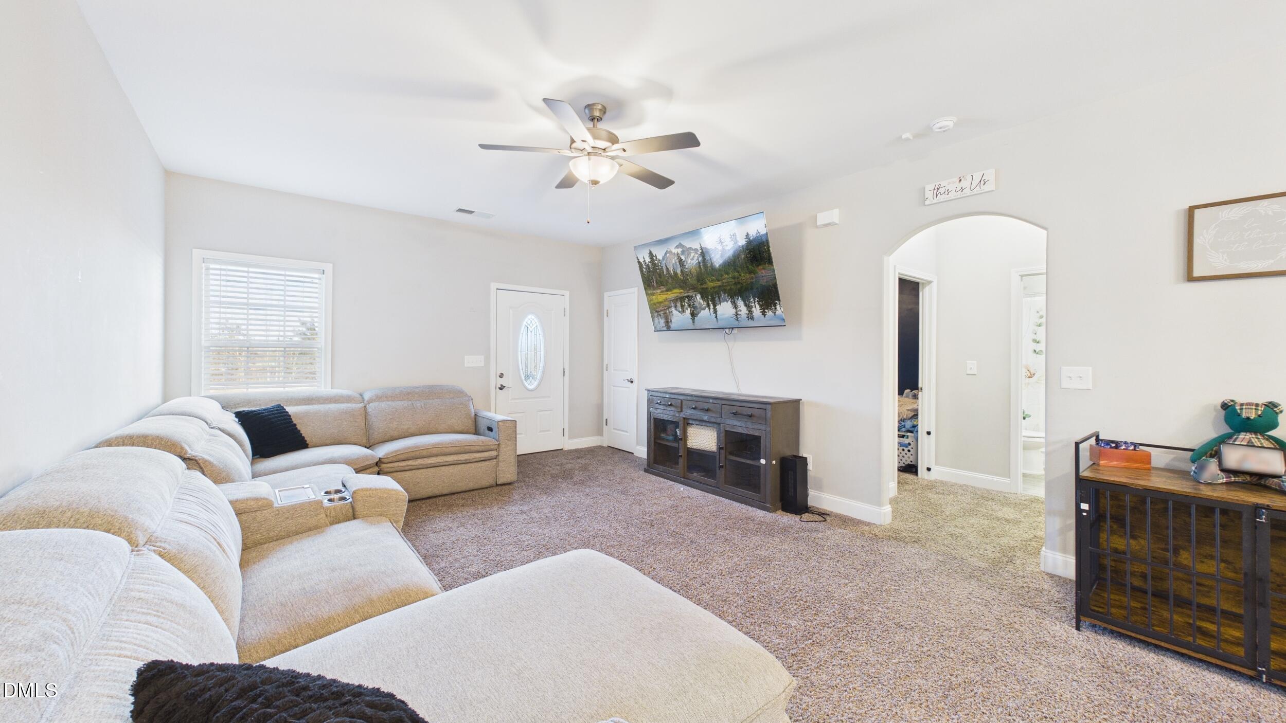 5930 Old 421 Road Liberty, NC 27298 - Photo 6 of 42 a living room with furniture and a fireplace