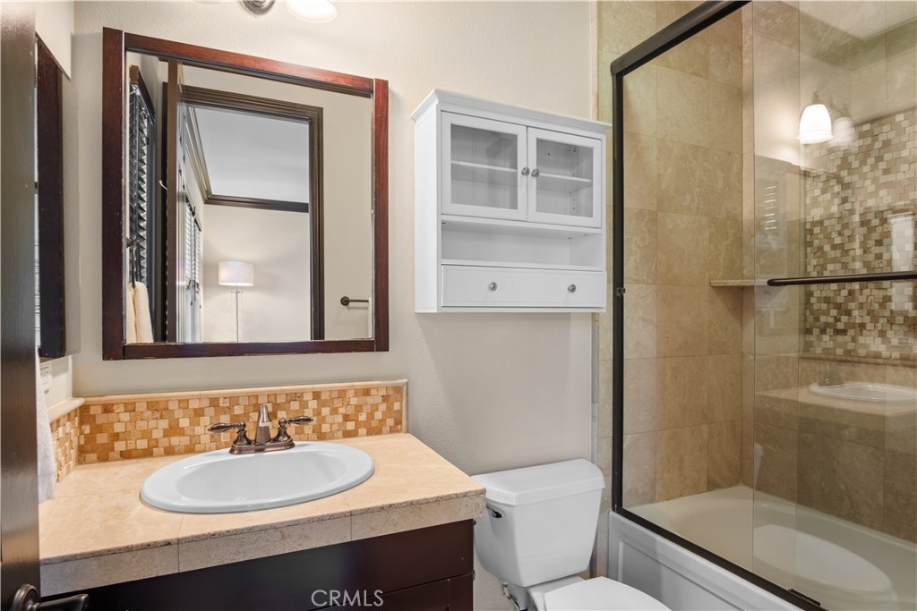 36 Via Divertirse San Clemente, CA 92673 - Photo 35 of 56 a bathroom with a sink toilet and shower