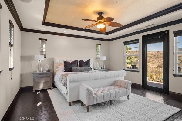 a bedroom with a bed and a fireplace