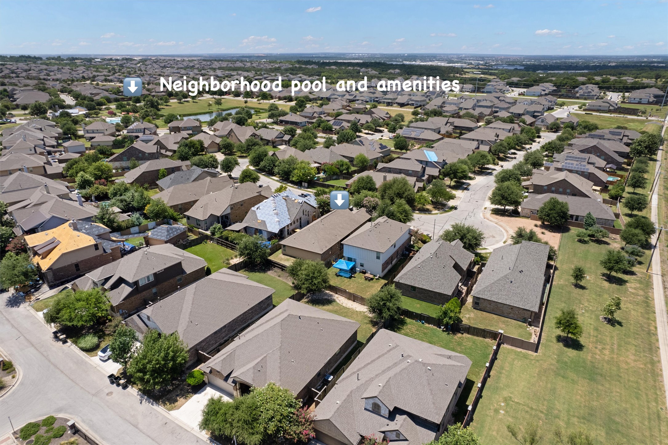 1128 Clearwing Circle Georgetown, TX 78626 - Photo 33 of 38 In the distance, you can see the Wildflower Pool and Club.