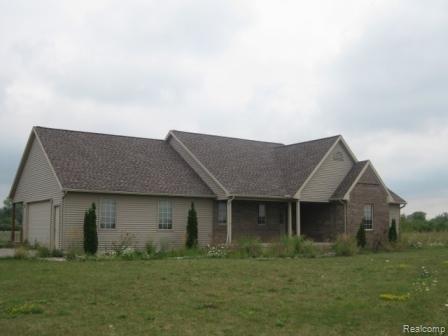 2139 East Sigler Road Carleton, MI 48117 - Photo 1 of 7 7110771628 Front view.jpg