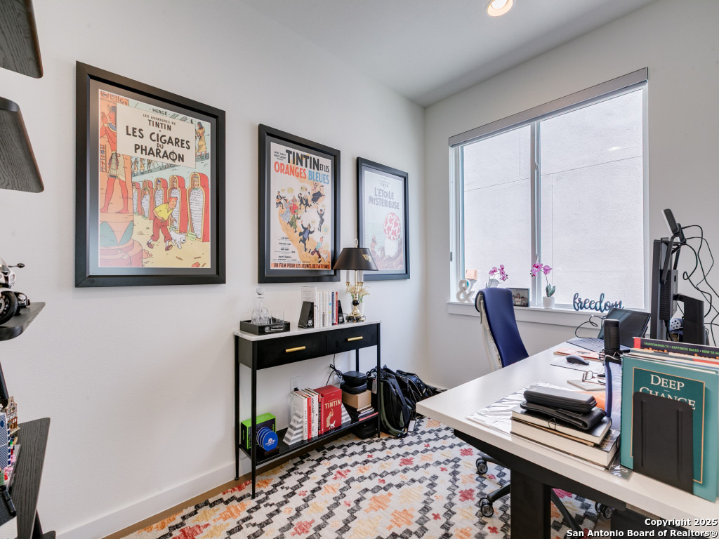 133 Terrell Road, Unit 1 Alamo Heights, TX 78209 - Photo 22 of 25 a living room with furniture and a window