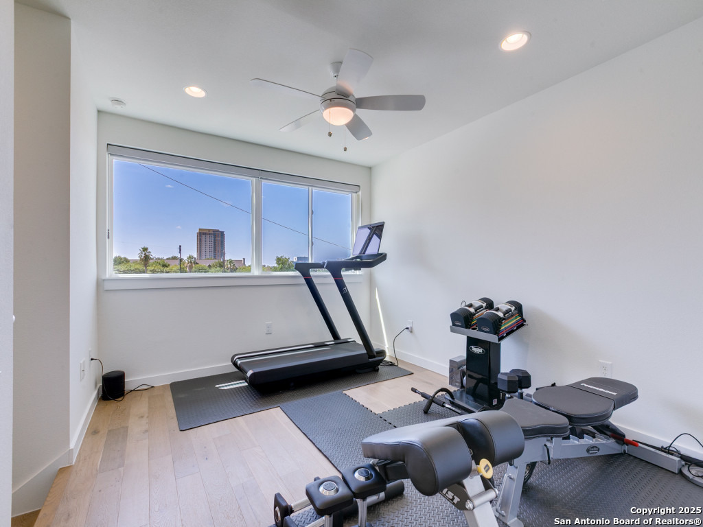 133 Terrell Road, Unit 1 Alamo Heights, TX 78209 - Photo 23 of 25 a room with gym equipment and a window
