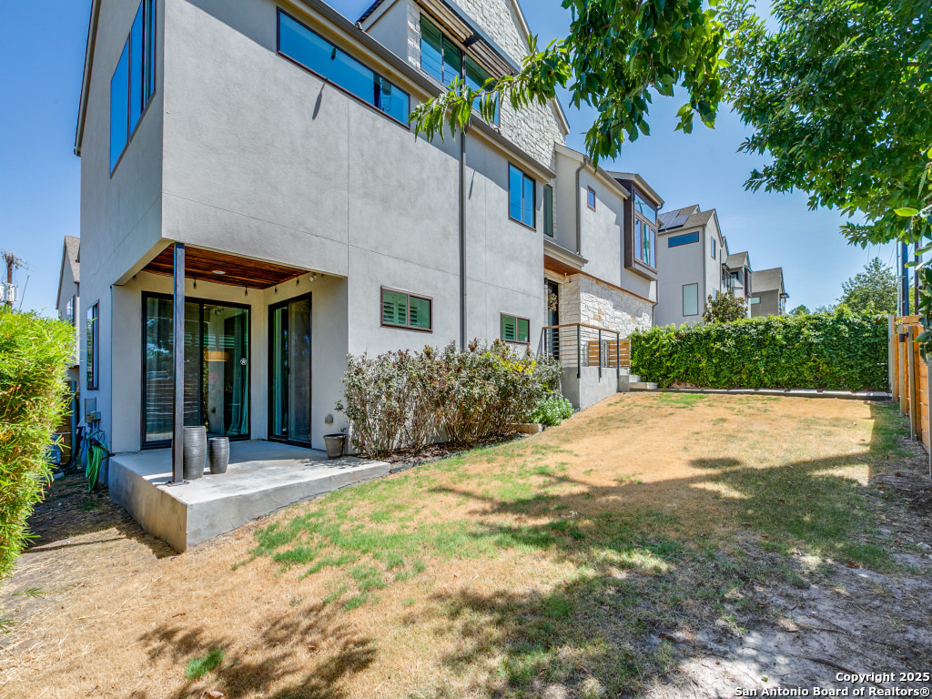 133 Terrell Road, Unit 1 Alamo Heights, TX 78209 - Photo 25 of 25 a front view of house with yard and green space