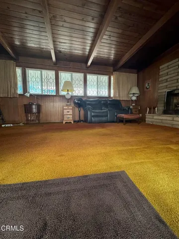 an empty room with furniture