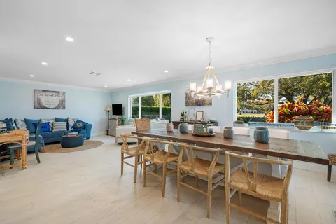 $1,125,000 | 413 South Country Club Drive, Atlantis, FL 33462