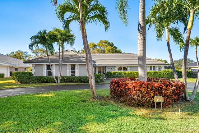 $1,125,000 | 413 South Country Club Drive, Atlantis, FL 33462