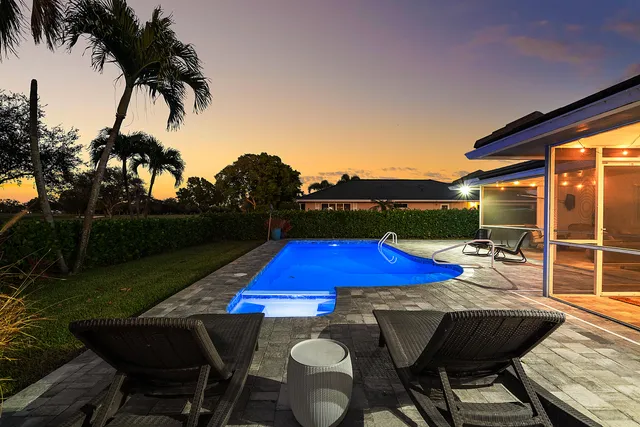 $1,125,000 | 413 South Country Club Drive, Atlantis, FL 33462