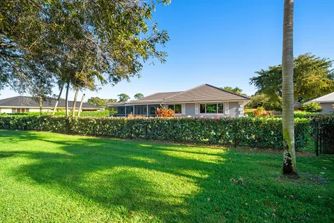 $1,125,000 | 413 South Country Club Drive, Atlantis, FL 33462