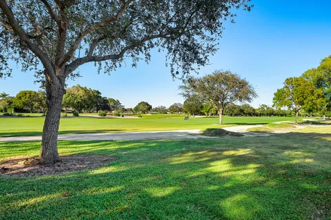 $1,125,000 | 413 South Country Club Drive, Atlantis, FL 33462