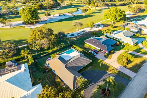 $1,125,000 | 413 South Country Club Drive, Atlantis, FL 33462