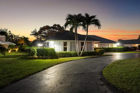$1,125,000 | 413 South Country Club Drive, Atlantis, FL 33462