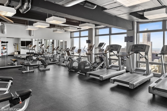 65 East Monroe Street, Unit 4015 Chicago, IL 60603 - Photo 10 of 14 a view of a room with gym equipment
