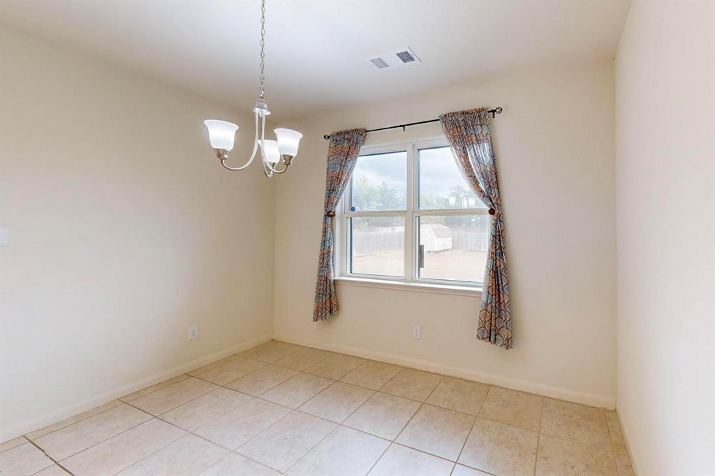 10 Kramer Court Sanger, TX 76266 - Photo 17 of 38 a view of an empty room with a window