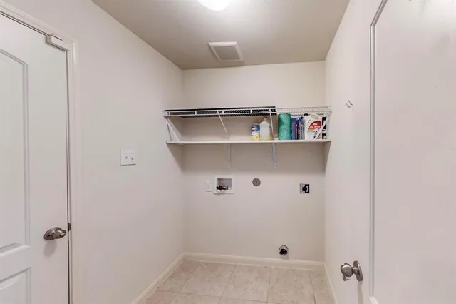 a view of small space with racks on the wall