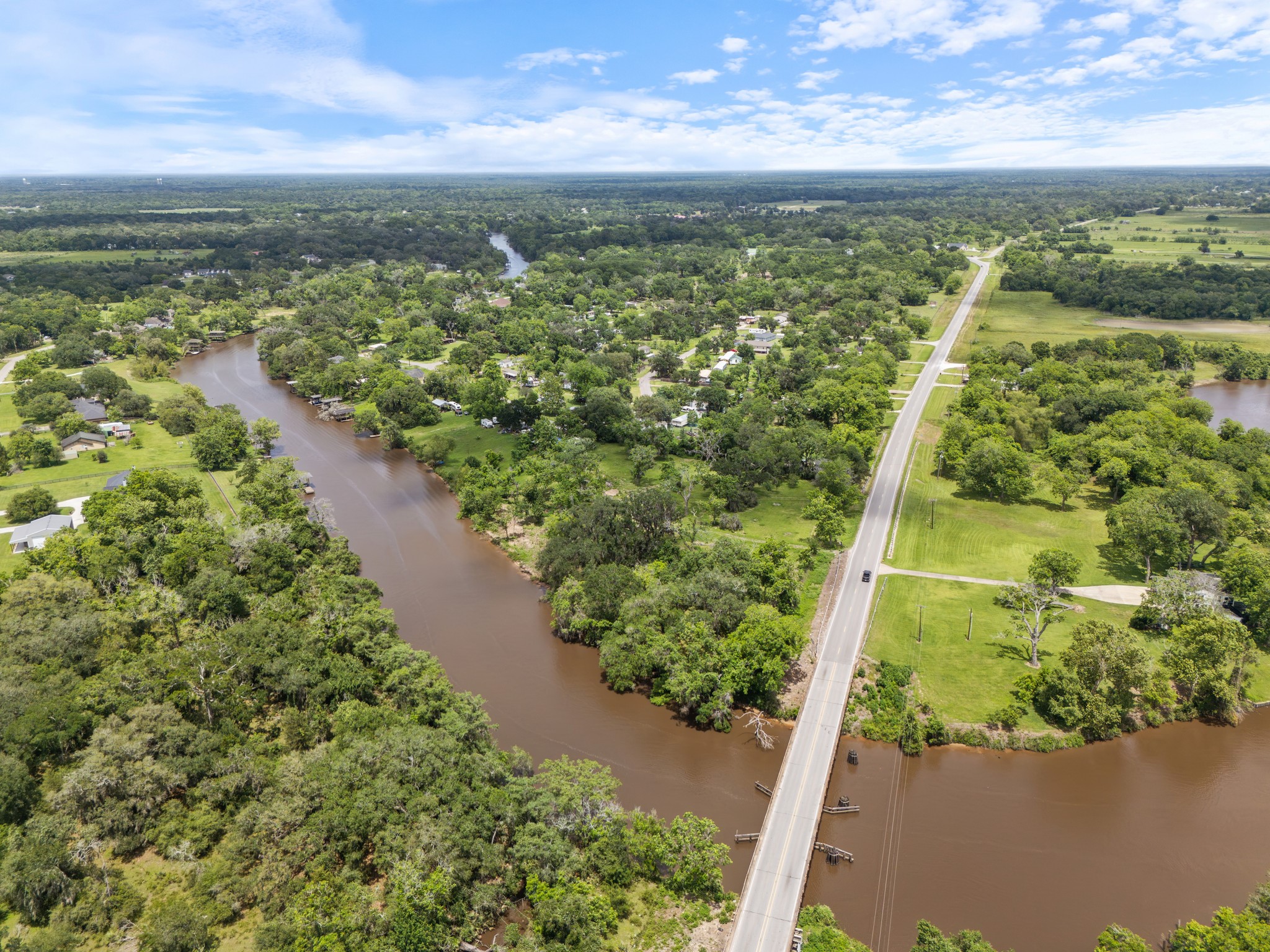 4610 FM 522 Road Brazoria, TX 77422 - Photo 15 of 18 a view of a lake with a mountain in the background
