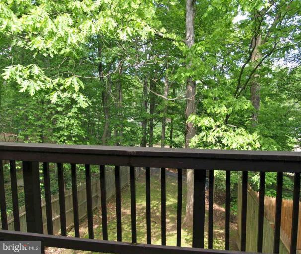 7910 Inverness Ridge Road Potomac, MD 20854 - Photo 3 of 25 Rear deck overlooking the trees!