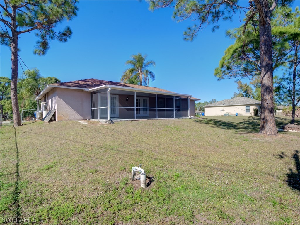 17525 Lee Road Fort Myers, FL 33967 - Photo 23 of 24 a view of a house with a yard