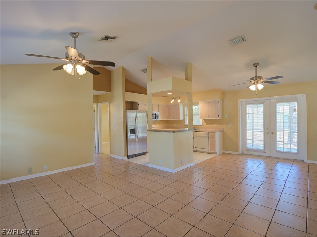 17525 Lee Road Fort Myers, FL 33967 - Photo 3 of 24 a view of a kitchen with a sink cabinets and window