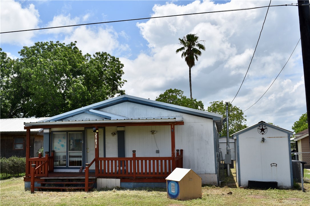 25051 Lake Shore Drive Mathis, TX 78368 - Photo 39 of 40 a view of a house with a porch