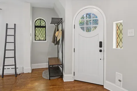a view of entryway with wooden floor