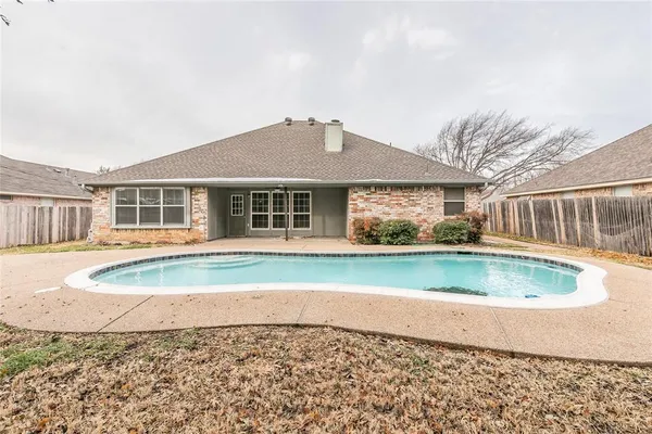 a view of pool with outdoor seating