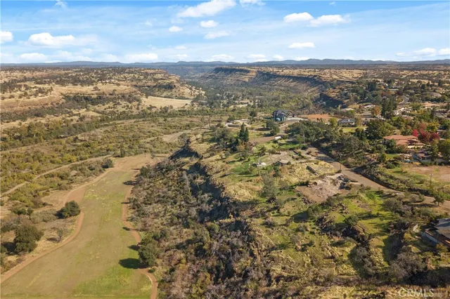 an aerial view of residential house and ocean view
