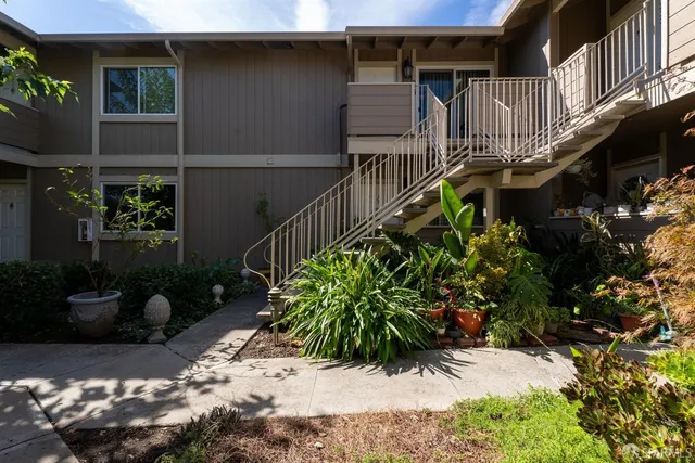an aerial view of a house with a garden