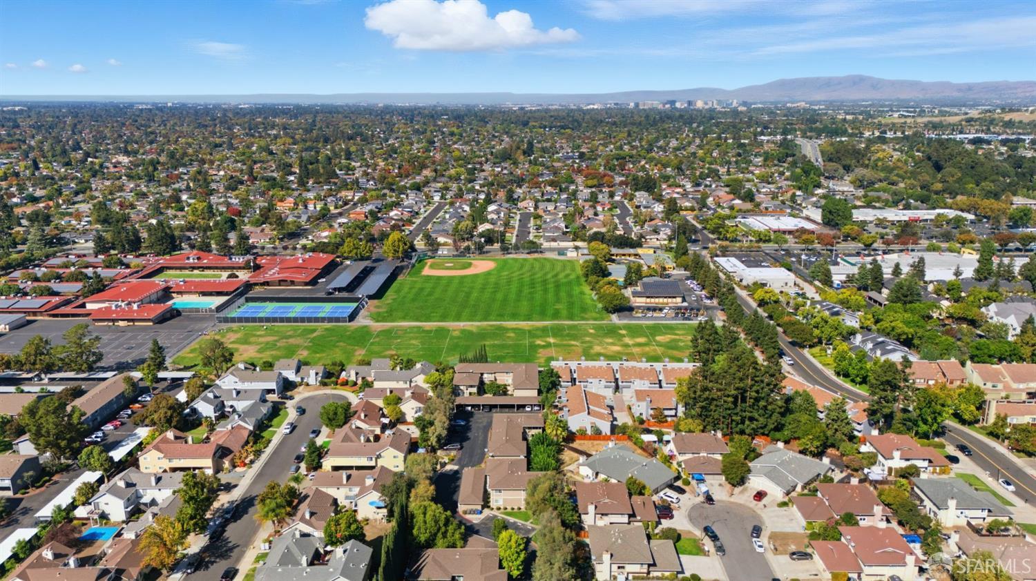 4970 Cherry Avenue, Unit 211 San Jose, CA 95118 - Photo 56 of 67 an aerial view of residential houses with outdoor space