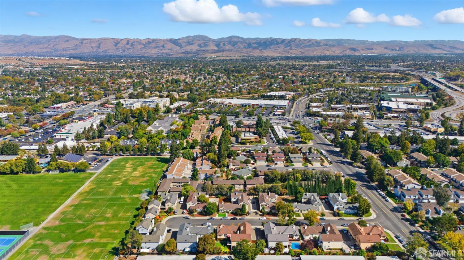 4970 Cherry Avenue, Unit 211 San Jose, CA 95118 - Photo 59 of 67 an aerial view of residential houses with outdoor space