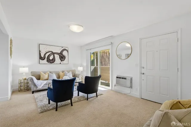 a kitchen with granite countertop stainless steel appliances a sink and cabinets